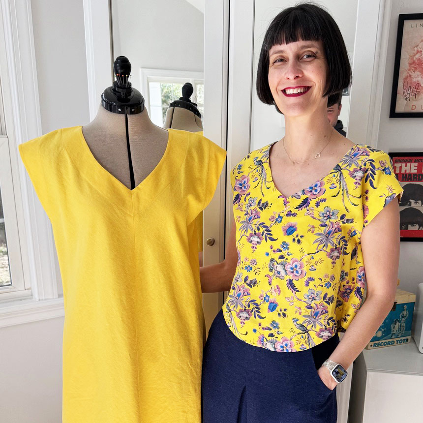 shop girl Janine in her Emerald top in Liberty silk, and dress in Brussels Washer linen.